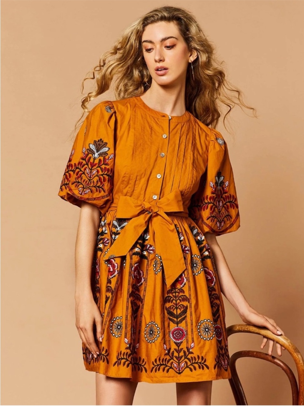 A loves a golden yellow cotton embroidered dress
